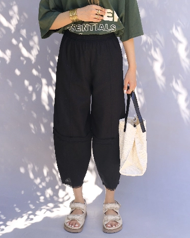 شلوار زنانه مشکی خمره ای